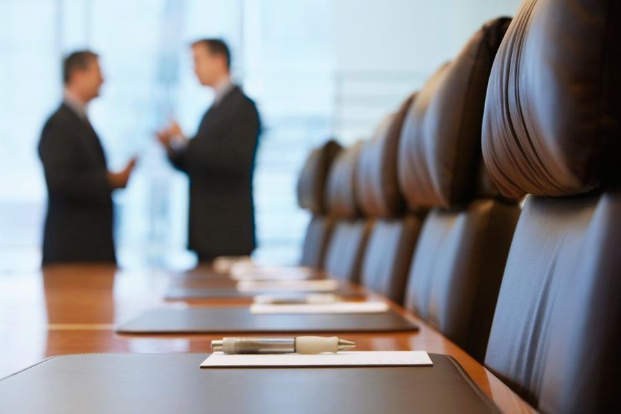 Attorneys Talking in Conference Room | Real Estate Attorney in Bloomington, IL